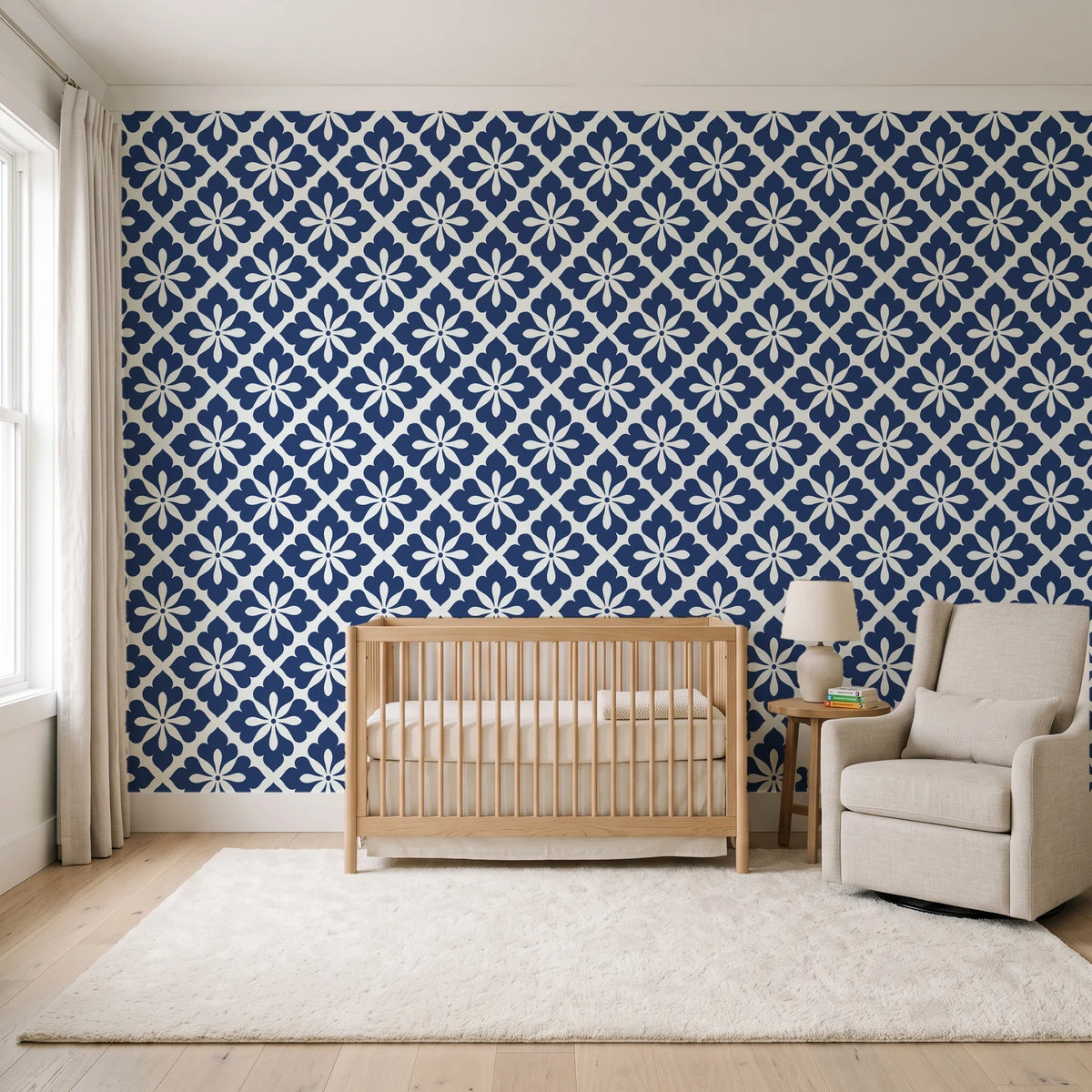 Carbon Bloom Navy tile floral wallpaper in a calm, light-filled nursery