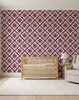 Carbon Bloom Oxblood tile floral wallpaper in a calm, light-filled nursery