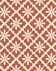 Carbon Bloom Terracotta tile floral wallpaper in terracotta and sand