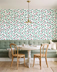 Cerulean Petal Emerald ditsy botanical wallpaper as a feature wall in a sunlit breakfast nook
