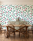 Cerulean Petal Emerald ditsy botanical wallpaper in a farmhouse dining room with a sage sideboard and rustic trestle table