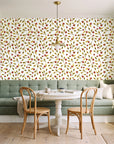 Cerulean Petal Marigold ditsy botanical wallpaper as a feature wall in a sunlit breakfast nook