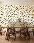 Cerulean Petal Marigold ditsy botanical wallpaper in a farmhouse dining room with a sage sideboard and rustic trestle table