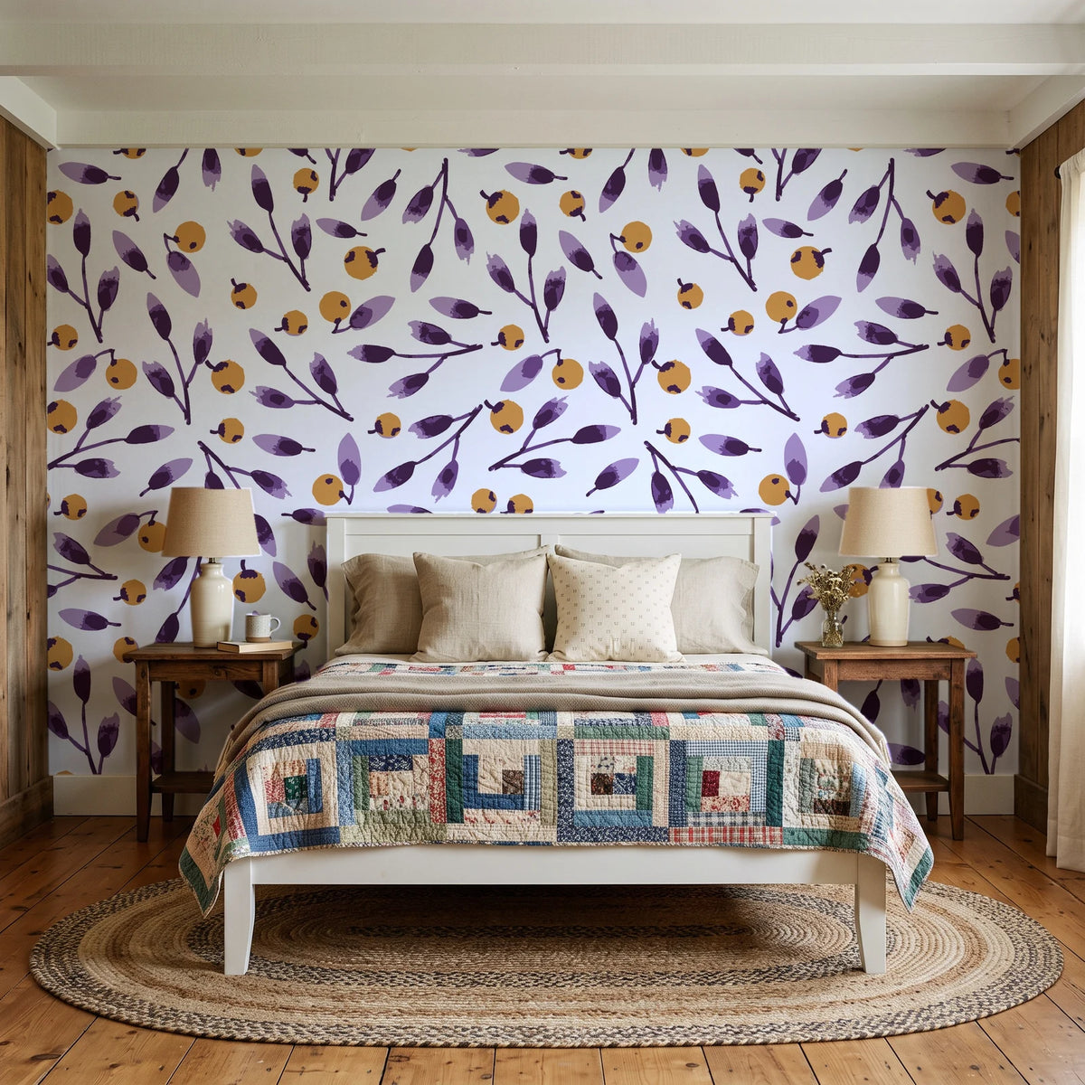 Cerulean Petal Plum ditsy botanical wallpaper behind a white cottage bed with a patchwork quilt in a cozy cottagecore bedroom
