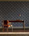 Chevron Etch Ebony geometric diamond wallpaper as a feature wall in a home study