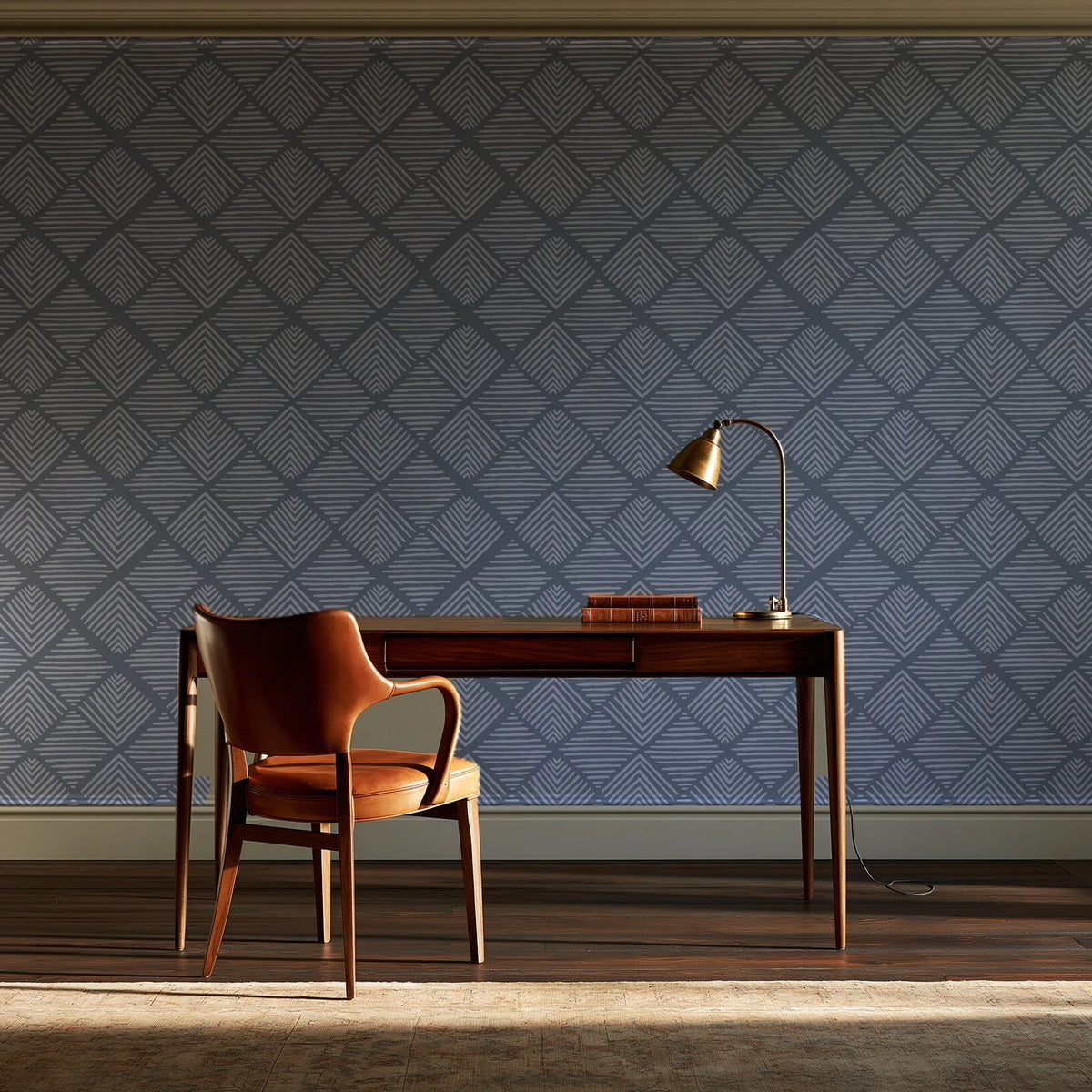 Chevron Etch Pewter geometric diamond wallpaper as a feature wall in a home study