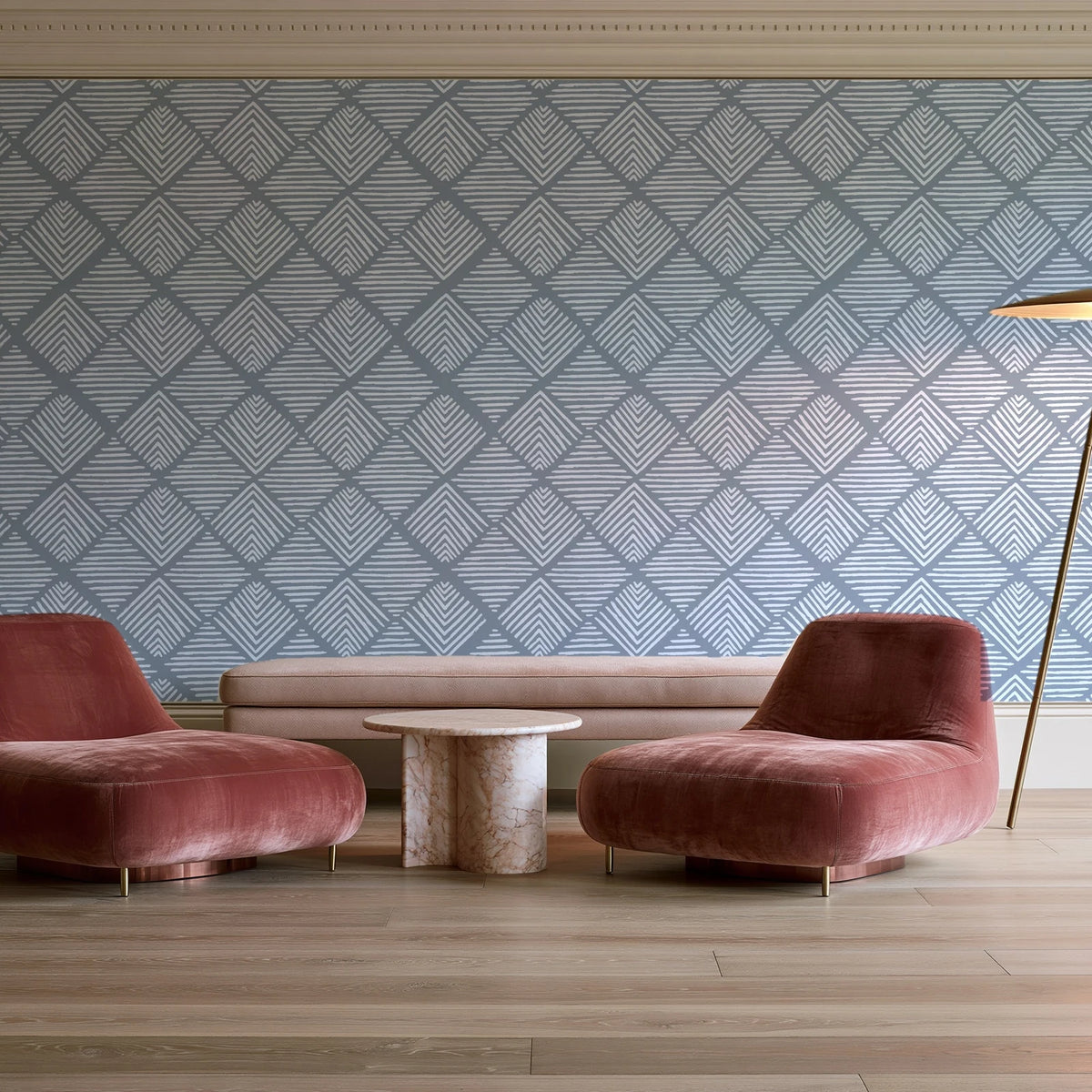 Chevron Etch Pewter geometric diamond wallpaper in a boutique hotel sitting area