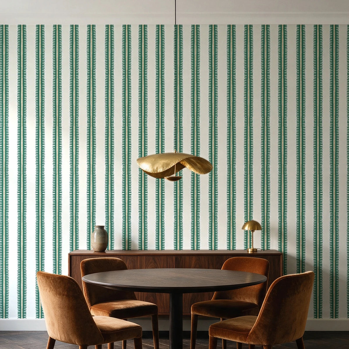 Citrine Column Emerald stripe wallpaper behind a walnut credenza and round table in an elegant dining room