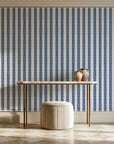 Citrine Column Navy stripe wallpaper on the wall of a grand entry foyer