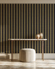 Citrine Column Noir stripe wallpaper on the wall of a grand entry foyer
