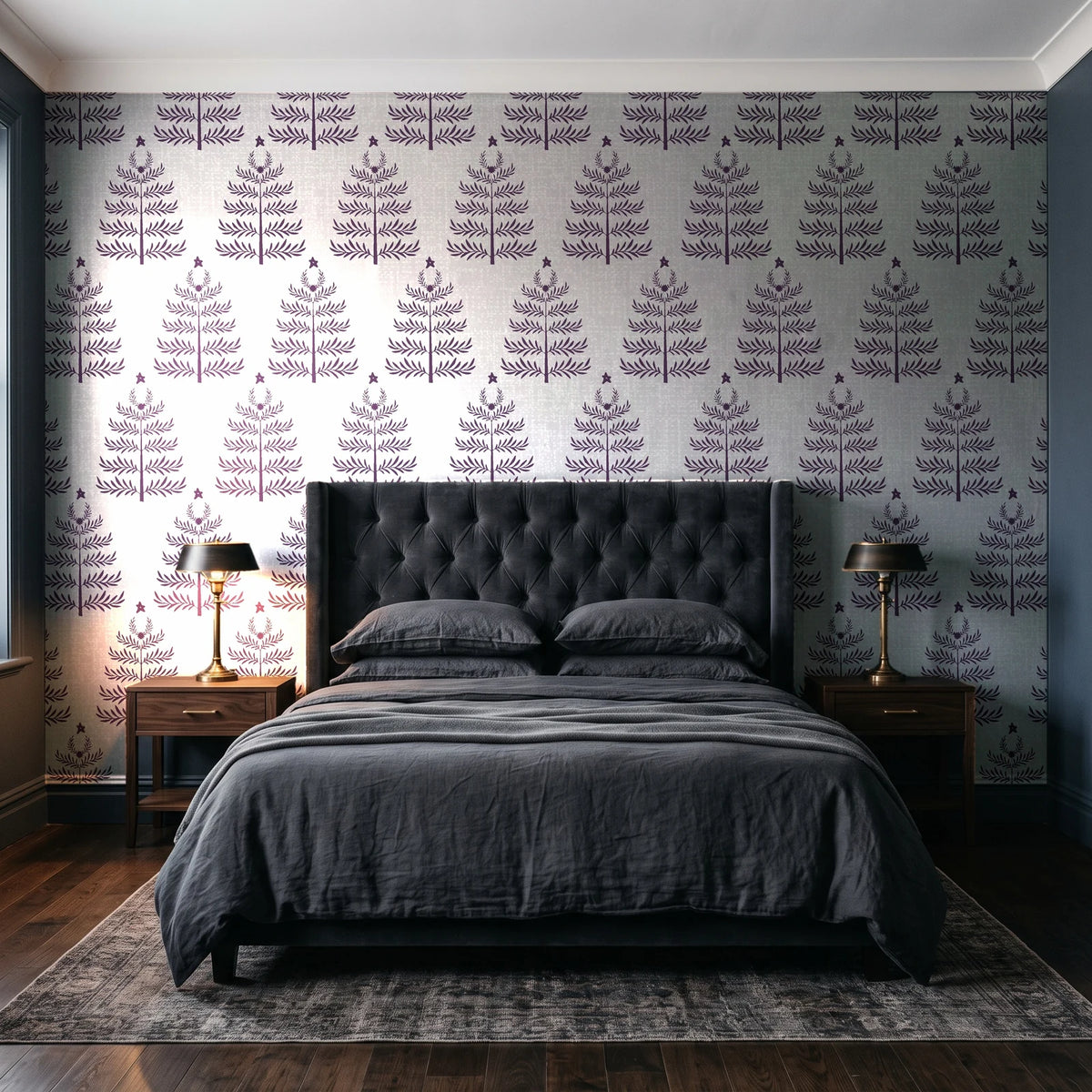 Clipped Dreams Plum tree wallpaper behind a tufted headboard in a dark, moody bedroom