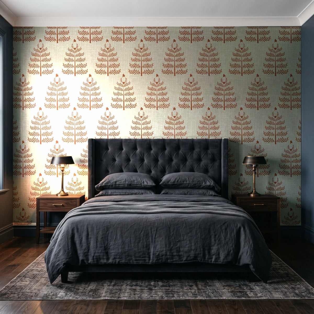 Clipped Dreams Terracotta tree wallpaper behind a tufted headboard in a dark, moody bedroom