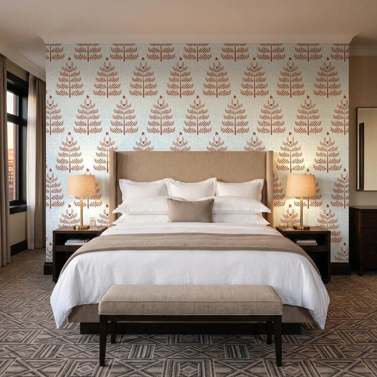 Clipped Dreams Terracotta tree wallpaper behind the headboard of a king bed in a contemporary hotel guest room
