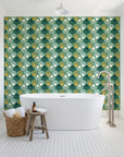 Coastal Scallop Emerald scallop shell wallpaper behind a freestanding tub in a bright coastal bathroom