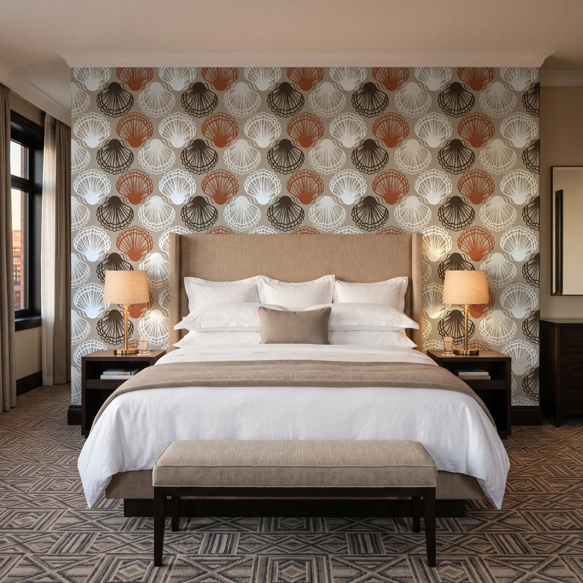 Coastal Scallop Mocha scallop shell wallpaper behind the headboard of a king bed in a contemporary hotel guest room