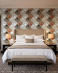 Coastal Scallop Mocha scallop shell wallpaper behind the headboard of a king bed in a contemporary hotel guest room