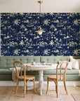 Coastal Village Midnight palm toile wallpaper as a feature wall in a sunlit breakfast nook