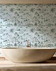 Coastal Village Sage palm toile wallpaper creating ambiance in a serene spa bathroom