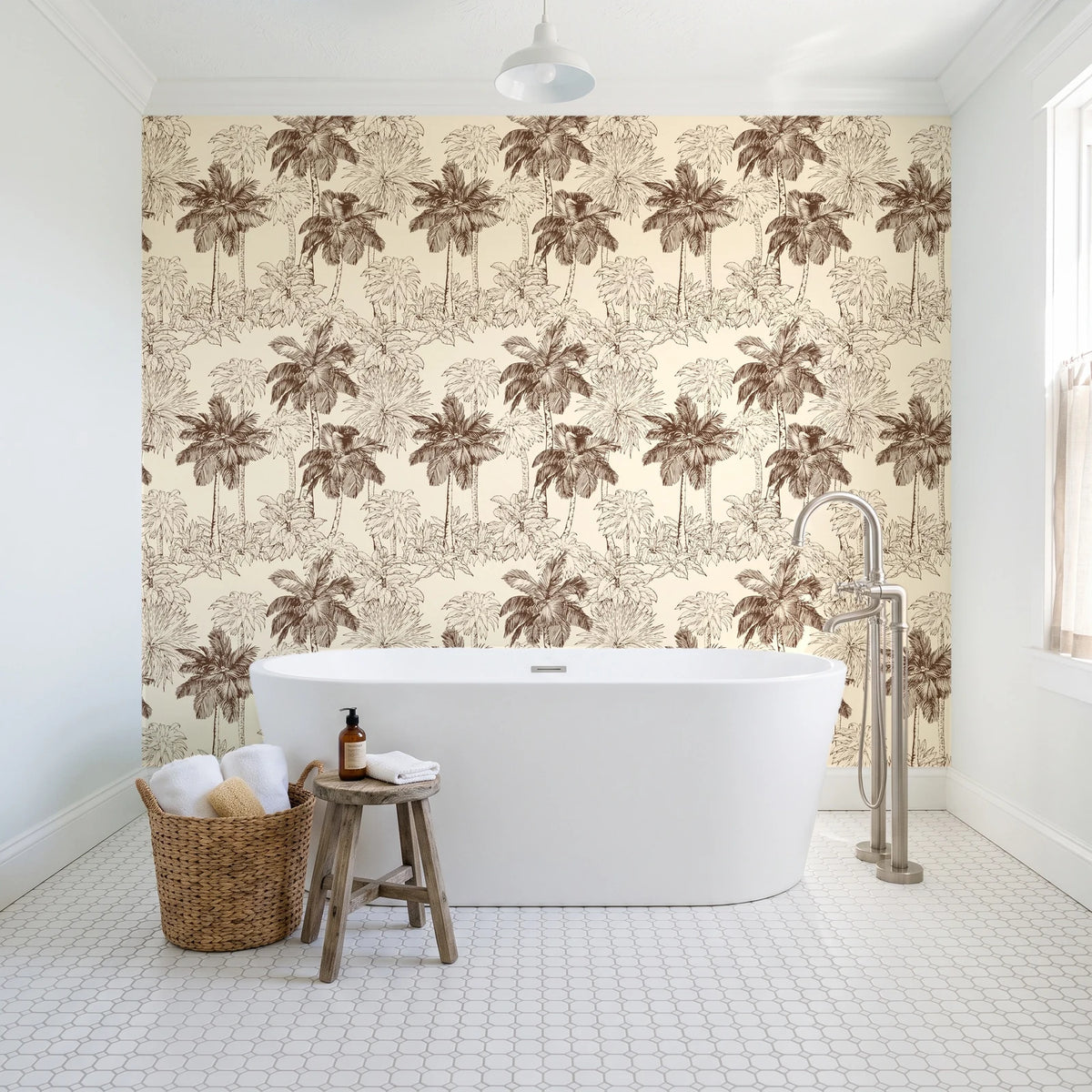 Conservatory Greens Chestnut tropical palm toile wallpaper behind a freestanding tub in a bright coastal bathroom
