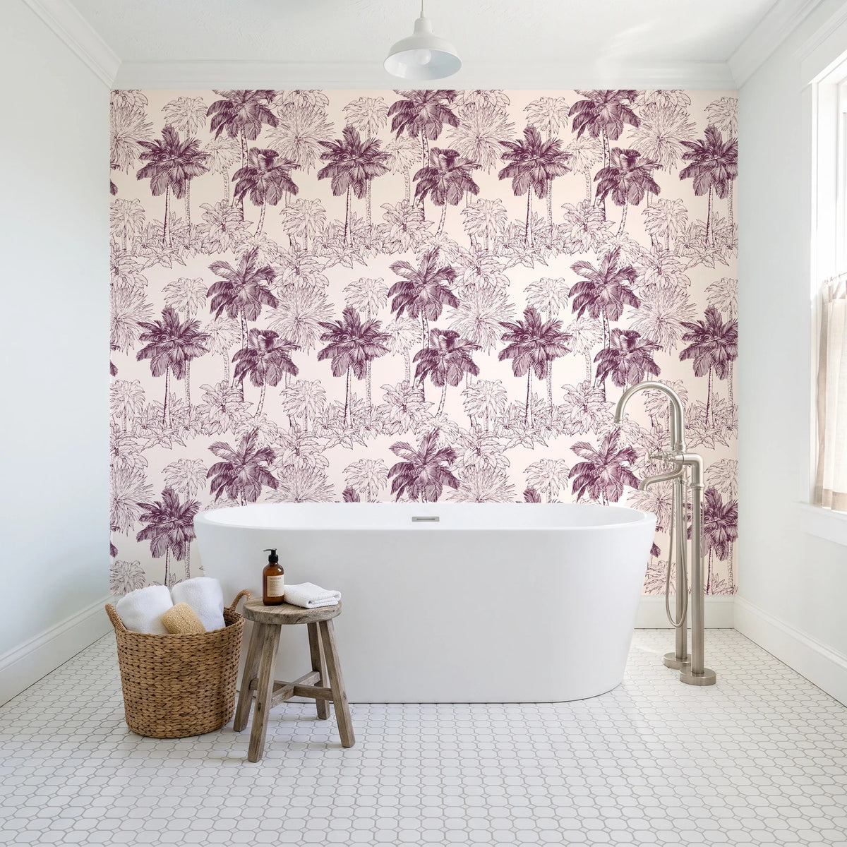 Conservatory Greens Mulberry tropical palm toile wallpaper behind a freestanding tub in a bright coastal bathroom