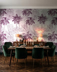 Conservatory Greens Mulberry tropical palm toile wallpaper in a dark moody dining room with a candlelit table