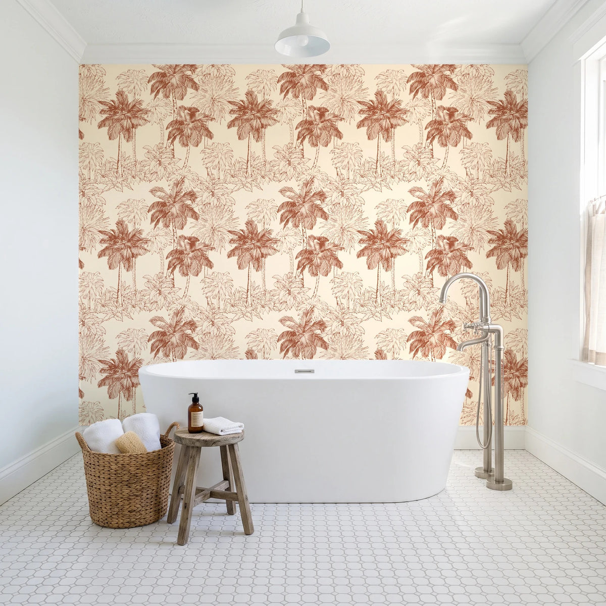 Conservatory Greens Terracotta tropical palm toile wallpaper behind a freestanding tub in a bright coastal bathroom