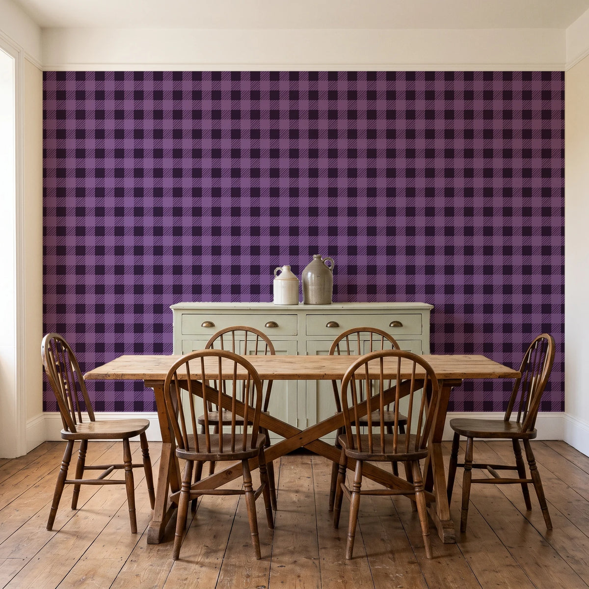 Cotton Candy Plum gingham wallpaper in a farmhouse dining room with a sage sideboard and rustic trestle table