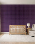 Cotton Candy Plum gingham wallpaper in a calm, light-filled nursery
