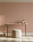 Cotton Candy Terracotta gingham wallpaper on the wall of a grand entry foyer