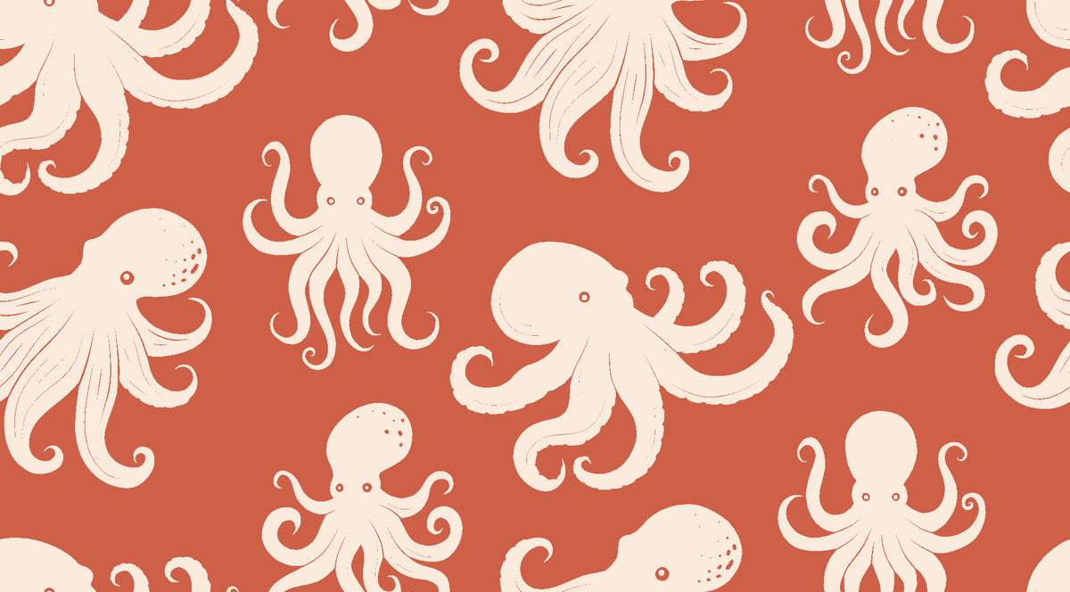Cresting Wave Coral octopus wallpaper in coral and cream