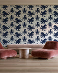 Cresting Wave Ink octopus wallpaper in a boutique hotel sitting area