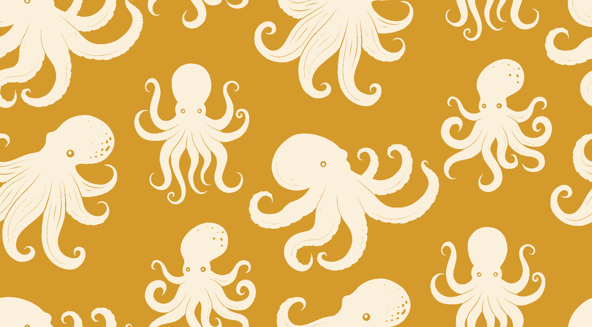 Cresting Wave Saffron octopus wallpaper in saffron and cream