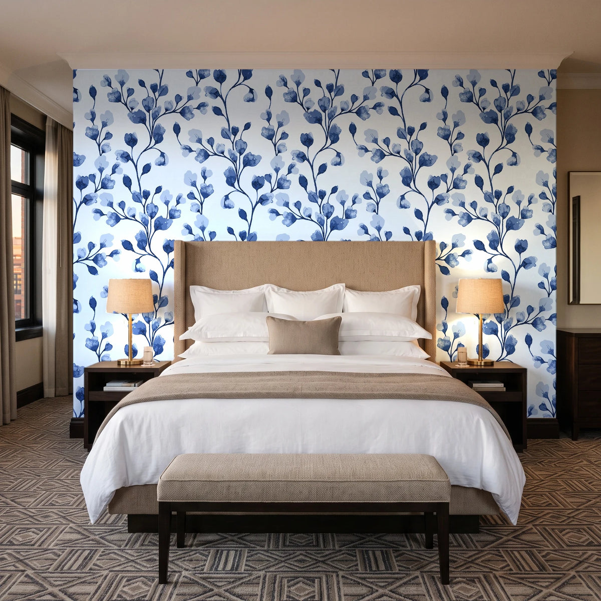 Desert Bloom Indigo botanical vine wallpaper behind the headboard of a king bed in a contemporary hotel guest room