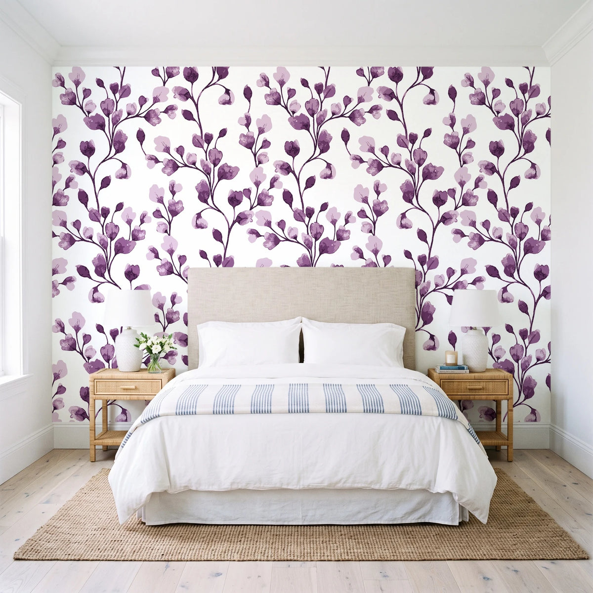 Desert Bloom Plum botanical vine wallpaper behind a queen bed in a bright coastal bedroom