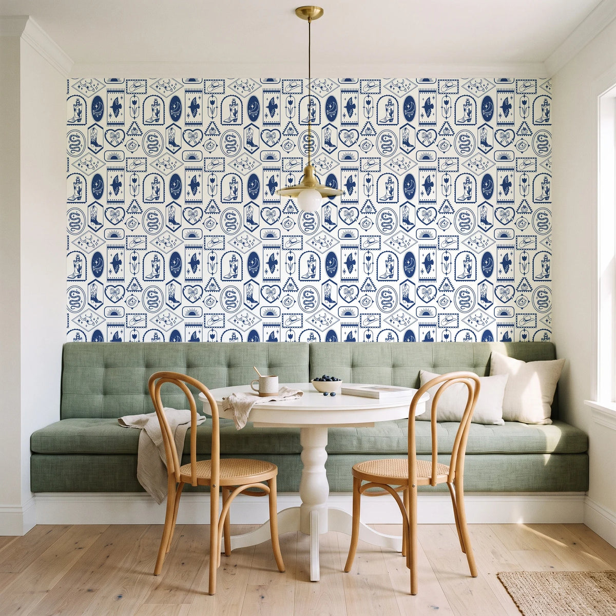 Desert Charms Indigo western icon wallpaper as a feature wall in a sunlit breakfast nook
