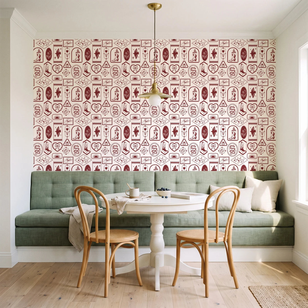 Desert Charms Oxblood western icon wallpaper as a feature wall in a sunlit breakfast nook