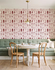 Desert Charms Oxblood western icon wallpaper as a feature wall in a sunlit breakfast nook
