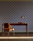 Desert Compass Aubergine geometric diamond wallpaper as a feature wall in a home study