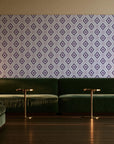 Desert Compass Aubergine geometric diamond wallpaper in an intimate luxury cocktail lounge