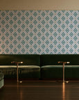 Desert Compass Emerald geometric diamond wallpaper in an intimate luxury cocktail lounge