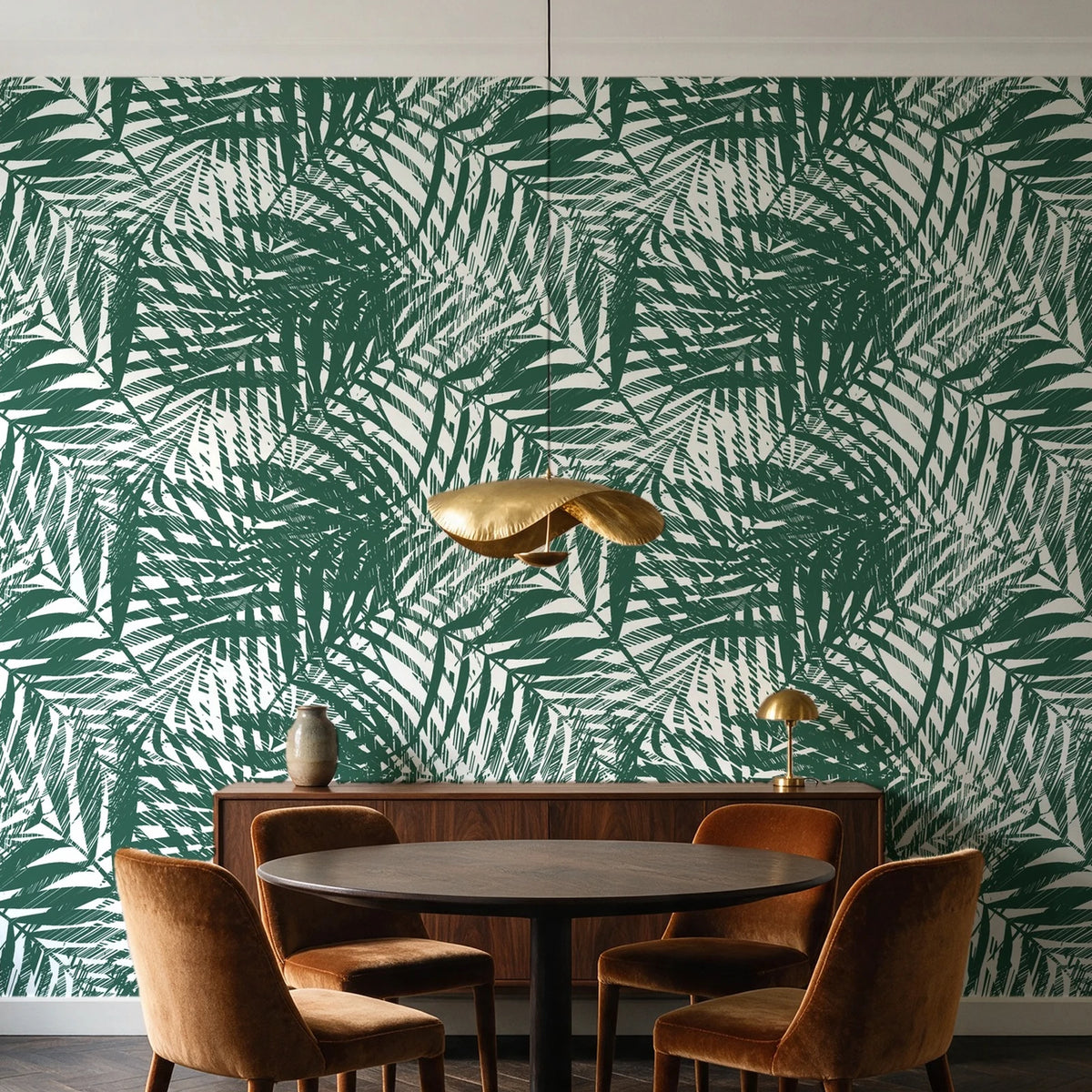 Desert Frond Emerald palm frond wallpaper behind a walnut credenza and round table in an elegant dining room