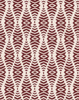 Desert Ritual Oxblood tribal geometric wallpaper in oxblood and blush