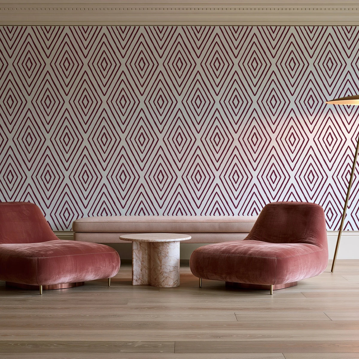 Diamond Echo Bordeaux tribal diamond wallpaper in a boutique hotel sitting area
