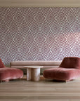 Diamond Echo Bordeaux tribal diamond wallpaper in a boutique hotel sitting area