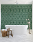 Diamond Echo Emerald tribal diamond wallpaper behind a freestanding tub in a bright coastal bathroom