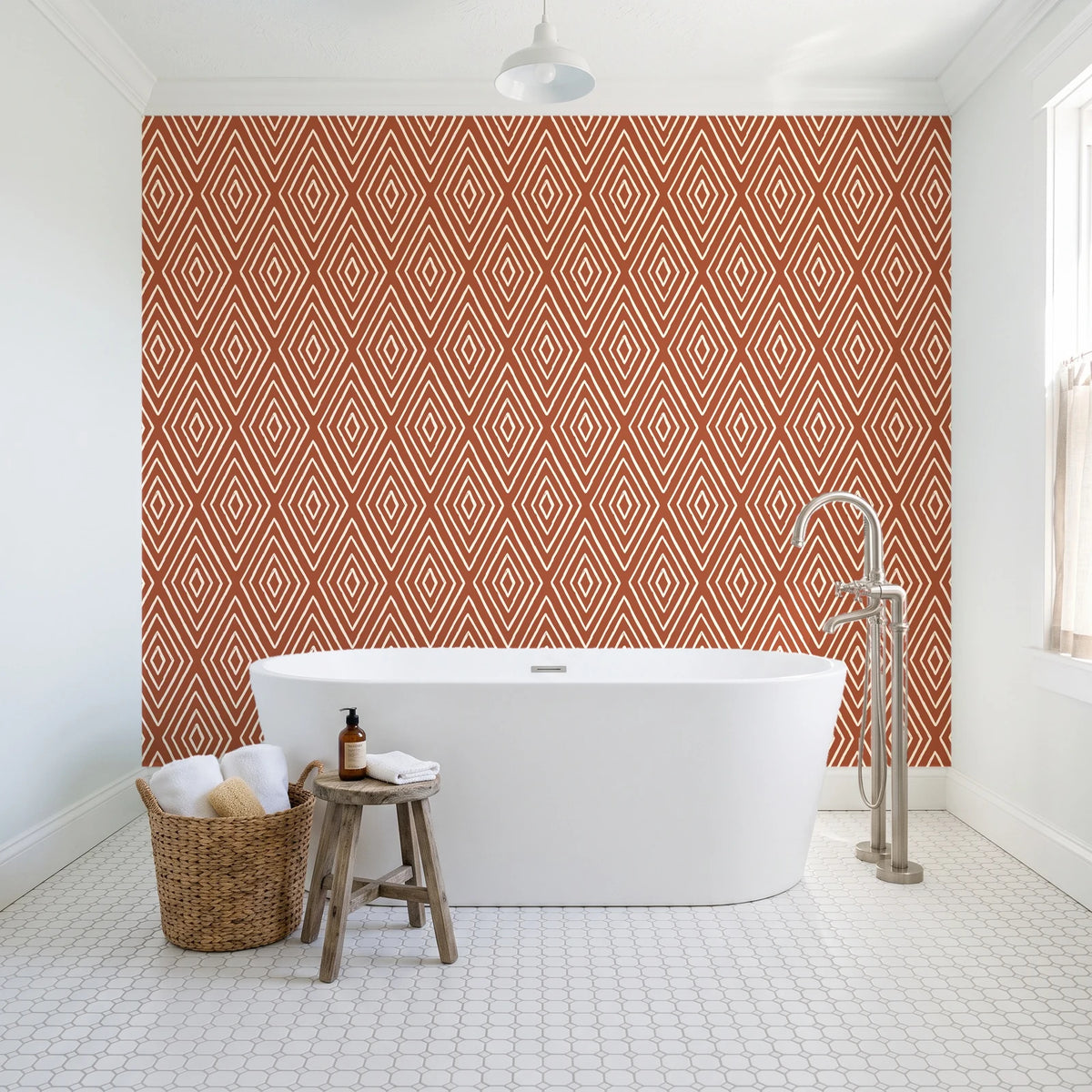 Diamond Echo Terracotta tribal diamond wallpaper behind a freestanding tub in a bright coastal bathroom