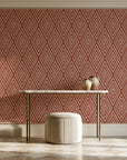 Diamond Echo Terracotta tribal diamond wallpaper on the wall of a grand entry foyer