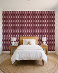 Dot Column Oxblood dotted wallpaper in a bright, cheerful child's bedroom
