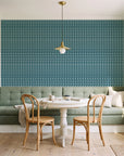 Dot Column Peacock dotted wallpaper as a feature wall in a sunlit breakfast nook