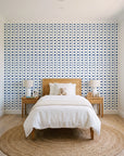 Dot Column Porcelain dotted wallpaper in a bright, cheerful child's bedroom